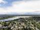 Aerial view of the property with lake and mountain views at 2048 Meade St, Denver, CO 80211