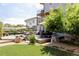 A nicely landscaped backyard with a multi-tiered patio and view of the house at 2048 Meade St, Denver, CO 80211