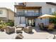 Relaxing deck featuring comfortable seating, dining area, and a hammock on the upper balcony at 2048 Meade St, Denver, CO 80211