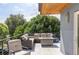 Rooftop deck featuring an outdoor sofa, fireplace, and seating area at 2048 Meade St, Denver, CO 80211