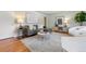 Stylish living room with hardwood floors, comfortable seating, and decorative accents at 3245 S High St, Englewood, CO 80113