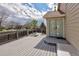 Gray composite deck with black metal railings and a view of the backyard and neighborhood at 2190 S Uravan St, Aurora, CO 80013