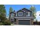 Charming two-story home featuring a brick accent, fresh paint and a two-car garage at 12742 Clermont St, Thornton, CO 80241
