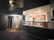 Interior view showcasing staircase and the kitchen, with warm wood cabinets and appliances, from the living room at 12742 Clermont St, Thornton, CO 80241