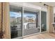 Back patio with sliding glass doors, view, and seating at 624 Simmental Loop, Castle Rock, CO 80104