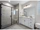 Bathroom with a walk-in shower and modern vanity at 624 Simmental Loop, Castle Rock, CO 80104