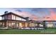 Luxury home with contemporary architecture and expansive windows at 624 Simmental Loop, Castle Rock, CO 80104