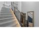 Elegant staircase with modern railing and led lighting at 624 Simmental Loop, Castle Rock, CO 80104