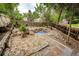Landscaped backyard featuring rock beds and a fenced perimeter at 3679 S Zeno Way, Aurora, CO 80013