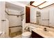 Cozy bathroom featuring a stand up shower, sink and vanity at 3679 S Zeno Way, Aurora, CO 80013