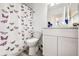 Charming bathroom featuring a patterned shower curtain, modern vanity, and neutral color scheme at 3679 S Zeno Way, Aurora, CO 80013