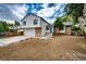 Well-maintained two-story home featuring a large front yard, two-car garage, and appealing architectural details at 3679 S Zeno Way, Aurora, CO 80013