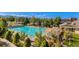 Resort-style pool with lap lanes, lounge seating and shade coverings at 8645 Coors St, Arvada, CO 80005