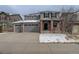 Charming two-story home with a three-car garage and a well-maintained front yard at 1640 Mcmurdo Trl, Castle Rock, CO 80108