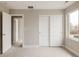 This bedroom has an organized closet space, bright light, carpeted floors and open door frames at 2134 S Galapago, Denver, CO 80223