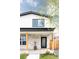 Close up of a front porch with stone facade and black trimmed windows at 2134 S Galapago, Denver, CO 80223
