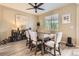 Dining room with a large window, modern table, and stylish decor for Gathering meals at 26072 E Fremont Pl, Aurora, CO 80016