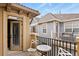 Charming balcony with seating and view of the surrounding architecture, perfect for outdoor relaxation at 7651 E 26Th Ave, Denver, CO 80238