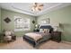 Cozy bedroom featuring a comfortable bed, soft lighting, and a serene ambiance for restful nights at 7651 E 26Th Ave, Denver, CO 80238