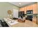 Charming kitchen features a breakfast bar with seating, modern appliances, and neutral tones at 7651 E 26Th Ave, Denver, CO 80238