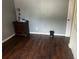 Empty bedroom showcasing wood floors, simple decor, and neutral paint at 5129 Chandler Way, Denver, CO 80239