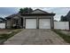 Charming single-story home with a two-car garage and a well-maintained front yard at 5129 Chandler Way, Denver, CO 80239