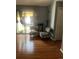 Cozy living room area with patterned chairs and a sliding door at 5129 Chandler Way, Denver, CO 80239
