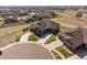 Expansive aerial view of the home on a cul-de-sac with mature landscaping and an extended driveway at 16406 W 85Th Ln # A, Arvada, CO 80007