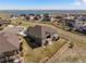 Beautiful aerial view of the home near the lake, showcasing a lovely patio and well-kept lawn in a desirable community at 16406 W 85Th Ln # A, Arvada, CO 80007