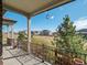 Back porch view of green open space and other houses at 16406 W 85Th Ln # A, Arvada, CO 80007
