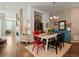 The dining room features stylish decor, hardwood floors, and seamlessly connected living spaces at 16406 W 85Th Ln # A, Arvada, CO 80007