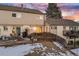 Private patio with a view and snowy landscaping at 4412 W Pondview Dr, Littleton, CO 80123