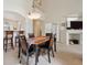 Dining area with a view to the living area and the second story at 604 S Yarrow St, Lakewood, CO 80226
