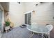 Inviting patio with outdoor seating and shade, ideal for al fresco dining at 604 S Yarrow St, Lakewood, CO 80226