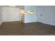 Open-concept living area with wood-look floors and abundant natural light at 943 S Zeno Way # 205, Aurora, CO 80017