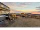 Backyard featuring a pergola, hot tub, and plenty of space for outdoor entertaining at 3234 Picketwire Way, Castle Rock, CO 80108