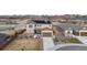 New home featuring solar panels, three car garage, landscaping, and a fenced yard at 3234 Picketwire Way, Castle Rock, CO 80108