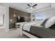 Comfortable main bedroom with a wood accent wall, ambient lighting, and a serene atmosphere for relaxation at 3234 Picketwire Way, Castle Rock, CO 80108