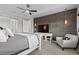 Spacious main bedroom featuring a wood accent wall, stylish decor, and a tranquil atmosphere for relaxation at 3234 Picketwire Way, Castle Rock, CO 80108