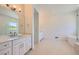 A spacious bathroom with double vanities, a glass-enclosed shower, and ample counter space at 366 Agoseris Way, Castle Rock, CO 80104