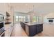 Spacious kitchen with an island, stainless steel appliances, and a view of the backyard at 366 Agoseris Way, Castle Rock, CO 80104