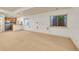 Spacious basement featuring carpet and a kitchenette at 383 S Franklin St, Denver, CO 80209