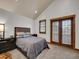 Spacious bedroom with modern furniture, carpet, and natural light at 383 S Franklin St, Denver, CO 80209