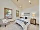 Bright bedroom with two windows, plush carpet, and contemporary furnishings at 383 S Franklin St, Denver, CO 80209