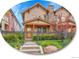 Charming two-story home featuring a stone chimney and a welcoming front porch with wood columns and decorative fence at 383 S Franklin St, Denver, CO 80209