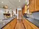 Gourmet kitchen with granite countertops, stainless steel appliances, and an open layout perfect for entertaining at 383 S Franklin St, Denver, CO 80209