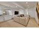 Open living area features lots of seating, recessed lighting, and large windows offering lots of natural light at 383 S Franklin St, Denver, CO 80209