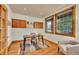 Charming office space with natural light, hardwood floors, wooden trim and built in cabinets, perfect for work or study at 383 S Franklin St, Denver, CO 80209