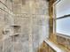 Tiled walk-in shower with built in bench and window at 383 S Franklin St, Denver, CO 80209