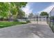 Community basketball court, fenced for privacy, with a view of the building at 2565 S Sheridan Blvd # 14, Lakewood, CO 80227